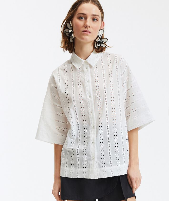 Camisa amplia